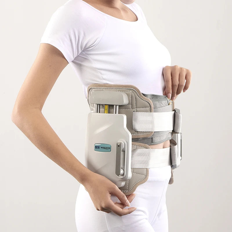 FDA 腰椎減圧装置 王慧李ベルト 腰皿の間のスペースに優れた家庭用トラクターベッドマッサージャー